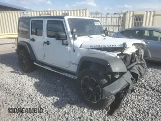 2016 Jeep Wrangler Unlimited Rubicon with VIN 1C4HJWFG4GL121906, listed as a Copart auction lot 48995385 with 96,632 mi miles and Salvage Title. Bid and sale history available at carsss.com. Image 4.