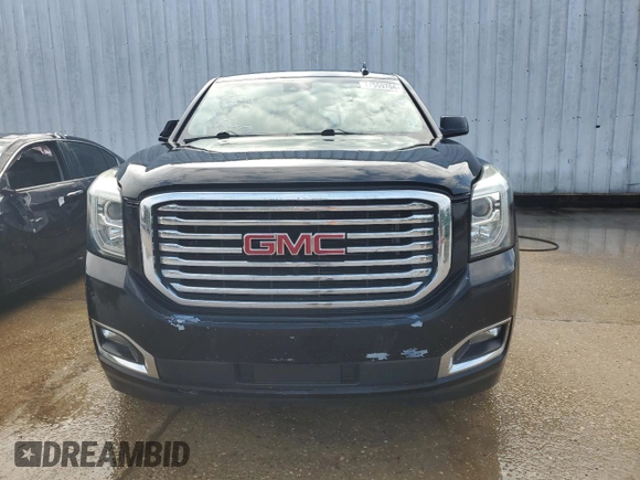 2017 GMC Yukon SLE with VIN 1GKS1AKC3HR307466, listed as a Copart auction lot 77559704 with 130,274 mi miles and Salvage Title. Bid and sale history available at carsss.com. Image 5.