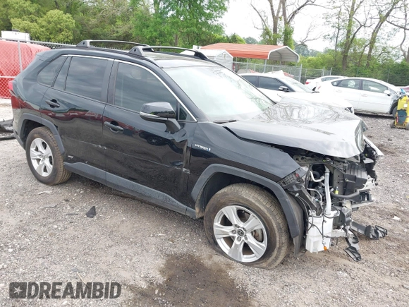 2021 Toyota RAV4 Hybrid XLE with VIN JTMRWRFV2MD133113, listed as a IAAI auction lot 42087394 with 103,019 mi miles and . Bid and sale history available at DreamBid. Image 1.