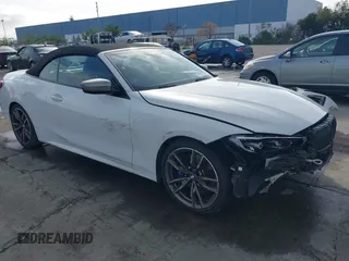 2022 BMW 4 Series M440i with VIN WBA53AT02NCJ20674, listed as a IAAI auction lot 41200398 with 28,235 mi miles and . Bid and sale history available at DreamBid. Image 1.