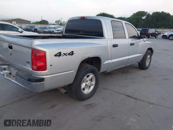 2005 Dodge Dakota SLT with VIN 1D7HW48N35S310086, listed as a IAAI auction lot 42020235 with 267,357 mi miles and . Bid and sale history available at DreamBid. Image 4.