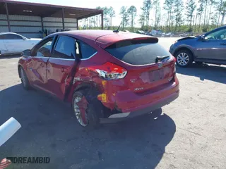 2015 Ford Focus Titanium with VIN 1FADP3N28FL215499, listed as a IAAI auction lot 41839092 with 152,102 mi miles. Bid and sale history available at carsss.com. Image 3.