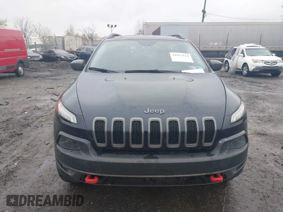 2014 Jeep Cherokee Trailhawk with VIN 1C4PJMBB5EW120432, listed as a IAAI auction lot 41973114 with 88,795 mi miles. Bid and sale history available at carsss.com. Image 6.