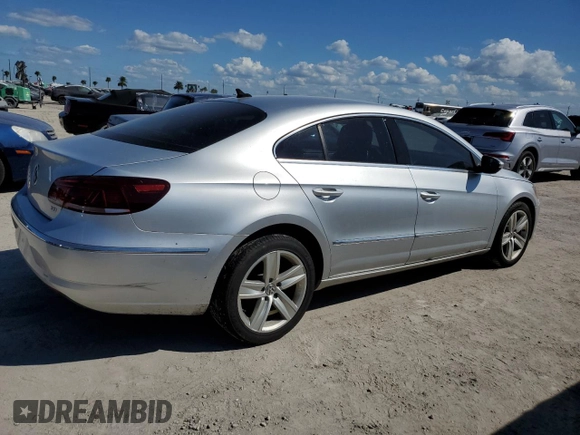 2013 Volkswagen CC R-Line z VIN WVWBN7AN1DE536851, wystawiony jako Copart lot #76972914 z przebiegiem 105 799 mil mil oraz Szkoda całkowita • Salvage title. Historia ofert i sprzedaży dostępna na DreamBid. Obrazek 3.