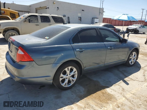 2012 Ford Fusion SE z VIN 3FAHP0HA0CR213729, wystawiony jako Copart lot #52458665 z przebiegiem 107 419 mil mil oraz Czysty tytuł • Clean title. Historia ofert i sprzedaży dostępna na DreamBid. Obrazek 3.