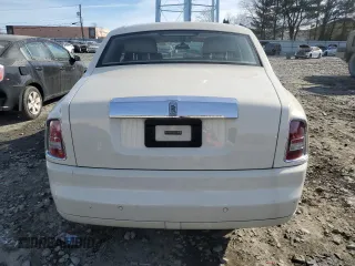 2004 Rolls-Royce Phantom z VIN SCA1S68414UX07249, wystawiony jako Copart lot #88060075 z przebiegiem Nie podano mil oraz Szkody całkowita. Historia ofert i sprzedaży dostępna na DreamBid. Obrazek 6.