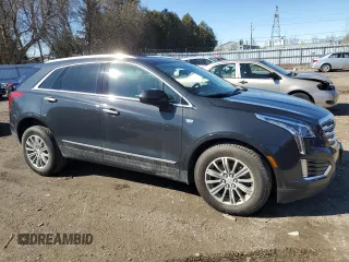 2019 Cadillac XT5 Luxury AWD with VIN 1GYKNDRS7KZ267795, listed as a Copart auction lot 49582025 with 134,241 mi miles and Clean title. Bid and sale history available at DreamBid. Image 4.