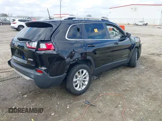2019 Jeep Cherokee Latitude with VIN 1C4PJLCBXKD490470, listed as a IAAI auction lot 41542565 with 71,800 mi miles. Bid and sale history available at carsss.com. Image 4.