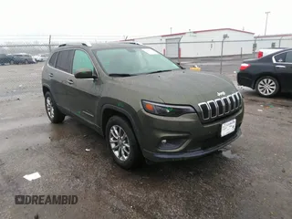 2020 Jeep Cherokee Latitude Plus with VIN 1C4PJMLB0LD602751, listed as a IAAI auction lot 38608028 with 97,040 mi miles. Bid and sale history available at carsss.com. Image 1.