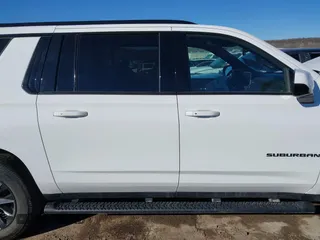 2022 Chevrolet Suburban Z71 with VIN 1GNSKDKD6NR150067, listed as a IAAI auction lot 41684815 with 73,416 mi miles and . Bid and sale history available at DreamBid. Image 13.