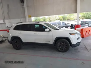 2016 Jeep Cherokee Latitude z VIN 1C4PJMCB5GW296303, wystawiony jako IAAI lot #42135490 z przebiegiem 136 503 mil mil oraz . Historia ofert i sprzedaży dostępna na DreamBid. Obrazek 13.