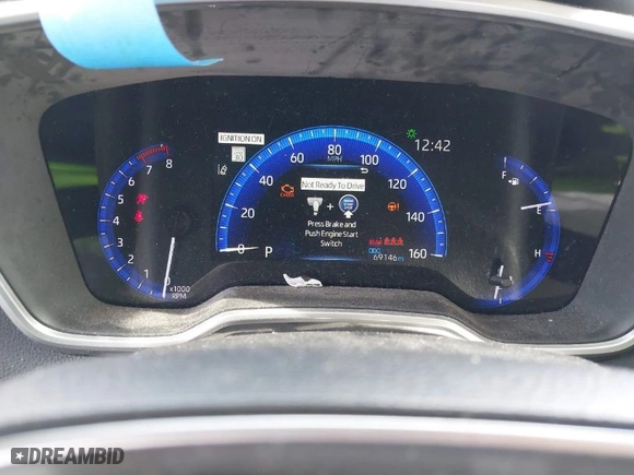 2022 Toyota Corolla Cross XLE with VIN 7MUDAAAG7NV013189, listed as a IAAI auction lot 41483059 with 69,146 mi miles. Bid and sale history available at carsss.com. Image 7.