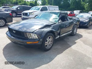 2009 Ford Mustang with VIN 1ZVHT80N395126614, listed as a IAAI auction lot 42322380 with 51,373 mi miles and . Bid and sale history available at DreamBid. Image 2.