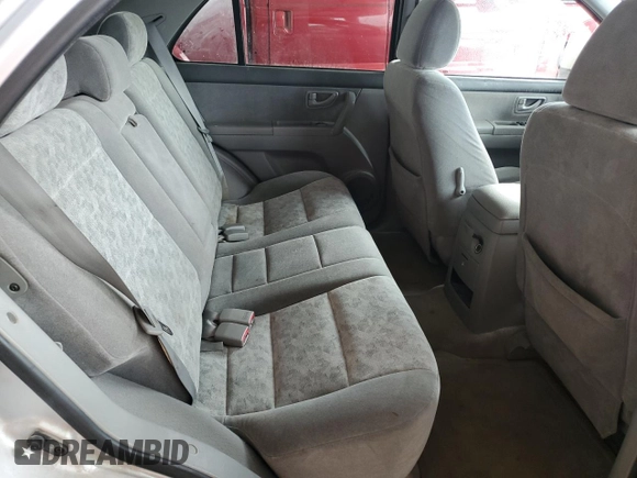 2005 Kia Sorento LX z VIN KNDJC733855449656, wystawiony jako Copart lot #52234685 z przebiegiem 114 398 mil mil oraz Szkoda całkowita • Salvage title. Historia ofert i sprzedaży dostępna na DreamBid. Obrazek 11.