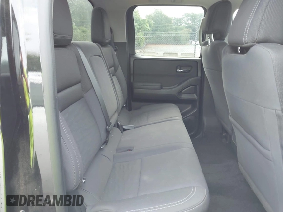 2023 Nissan Frontier SV with VIN 1N6ED1EK7PN609865, listed as a IAAI auction lot 42242070 with 56,462 mi miles and . Bid and sale history available at DreamBid. Image 8.