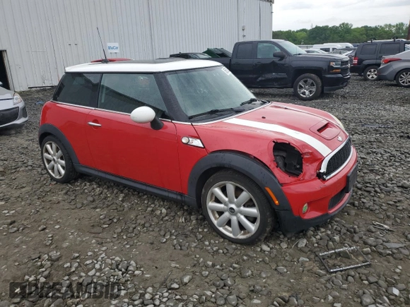 2007 MINI Hardtop S with VIN WMWMF73507TL86439, listed as a Copart auction lot 56500525 with 153,944 mi miles and Salvage title. Bid and sale history available at DreamBid. Image 4.
