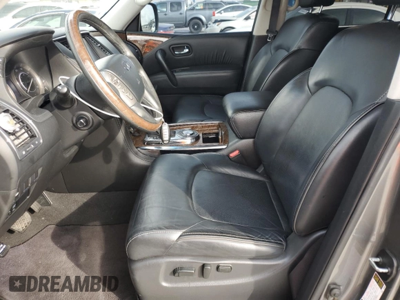 2017 Infiniti QX80 z VIN JN8AZ2NF1H9643990, wystawiony jako Copart lot #55598085 z przebiegiem 129 961 mil mil oraz Szkody całkowita. Historia ofert i sprzedaży dostępna na DreamBid. Obrazek 7.