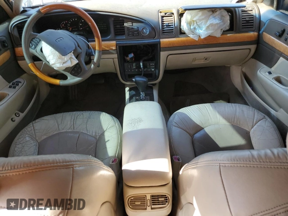 2001 Lincoln Continental with VIN 1LNHM97V61Y604213, listed as a Copart auction lot 52517535 with 112,391 mi miles and Salvage Title. Bid and sale history available at DreamBid. Image 8.