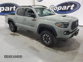 2023 Toyota Tacoma SR5 z VIN 3TMAZ5CN3PM210839, wystawiony jako Copart lot #88169495 z przebiegiem 17 766 mil mil oraz Czysty tytuł • Clean title. Historia ofert i sprzedaży dostępna na DreamBid. Obrazek 4.
