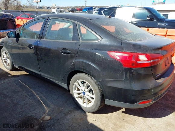 2018 Ford Focus SE with VIN 1FADP3F21JL259271, listed as a IAAI auction lot 41689494 with 94,190 mi miles. Bid and sale history available at carsss.com. Image 3.