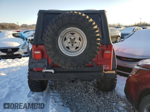 2003 Jeep Wrangler Sport with VIN 1J4FA49S73P301468, listed as a Copart auction lot 87415164 with 127,985 mi miles and Salvage Title. Bid and sale history available at carsss.com. Image 6.