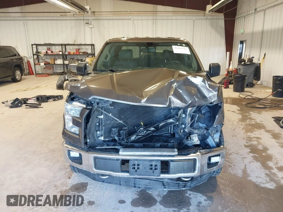 2015 Ford F-150 XLT with VIN 1FTEW1EFXFFB14990, listed as a IAAI auction lot 41681520 with 121,255 mi miles. Bid and sale history available at carsss.com. Image 13.