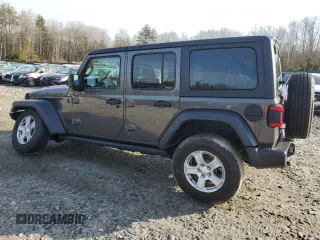2020 Jeep Wrangler Unlimited Sport with VIN 1C4HJXDM7LW277445, listed as a Copart auction lot 82929714 with 27,570 mi miles and Salvage title. Bid and sale history available at DreamBid. Image 2.