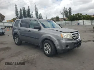 2009 Honda Pilot LX with VIN 5FNYF382X9B028461, listed as a Copart auction lot 52068575 with 189,267 mi miles and Salvage title. Bid and sale history available at DreamBid. Image 4.
