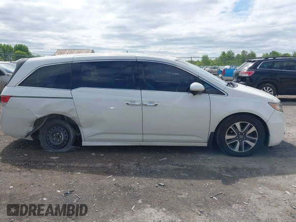 2015 Honda Odyssey Touring Elite с VIN 5FNRL5H91FB012330, выставлен на аукционе IAAI как лот 42307107 с пробегом 152 087 миль миль и . История ставок и продаж доступна на DreamBid. Изображение 14.