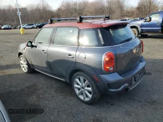 2016 MINI Countryman S z VIN WMWZC5C52GWP49650, wystawiony jako Copart lot #49153185 z przebiegiem 166 695 mil mil oraz Szkody całkowita. Historia ofert i sprzedaży dostępna na DreamBid. Obrazek 2.