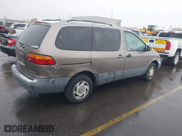 1999 Toyota Sienna LE with VIN 4T3ZF13C9XU164032, listed as a IAAI auction lot 41916673 with 296,628 mi miles and . Bid and sale history available at DreamBid. Image 4.