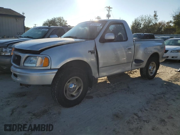 1998 Ford F-150 with VIN 2FTZF07W8WCA96137, listed as a Copart auction lot 82886074 with 181,690 mi miles and Salvage title. Bid and sale history available at DreamBid. Image 1.