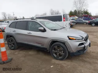 2016 Jeep Cherokee 75th Anniversary with VIN 1C4PJLCB9GW362233, listed as a IAAI auction lot 41726905 with 197,422 mi miles. Bid and sale history available at carsss.com. Image 14.