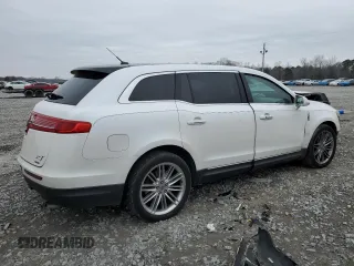 2014 Lincoln MKT EcoBoost with VIN 2LMHJ5ATXEBL50487, listed as a Copart auction lot 46649885 with 187,261 mi miles and Salvage Title. Bid and sale history available at DreamBid. Image 3.