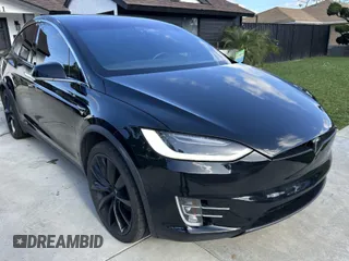 2019 Tesla Model X 75D with VIN 5YJXCDE26KF162372, listed as a IAAI auction lot 41611262 with 35,966 mi miles. Bid and sale history available at carsss.com. Image 1.