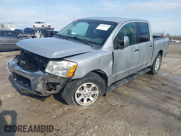 2005 Nissan Titan SE with VIN 1N6BA07B15N543247, listed as a IAAI auction lot 41152742 with 172,088 mi miles and . Bid and sale history available at DreamBid. Image 2.
