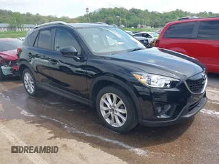 2013 Mazda CX-5 Grand Touring with VIN JM3KE4DE6D0148030, listed as a IAAI auction lot 42082947 with 119,432 mi miles and . Bid and sale history available at carsss.com. Image 1.