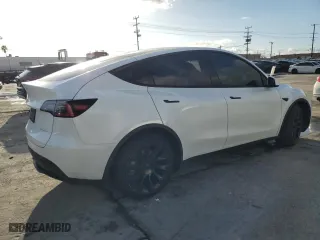 2020 Tesla Model Y Long Range with VIN 5YJYGDEE5LF040347, listed as a Copart auction lot 45598615 with 72,179 mi miles and Salvage Title. Bid and sale history available at carsss.com. Image 3.