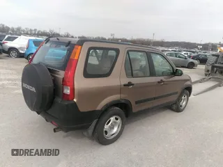 2004 Honda CR-V LX with VIN JHLRD78454C024250, listed as a IAAI auction lot 41227320 with 317,109 mi miles and . Bid and sale history available at carsss.com. Image 4.