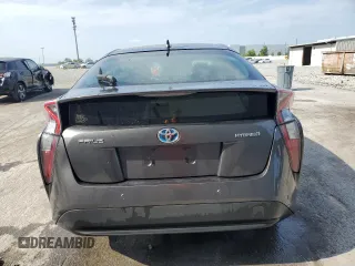 2017 Toyota Prius Two z VIN JTDKBRFU9H3568985, wystawiony jako Copart lot #56300855 z przebiegiem 104 705 mil mil oraz Szkoda całkowita • Salvage title. Historia ofert i sprzedaży dostępna na DreamBid. Obrazek 6.