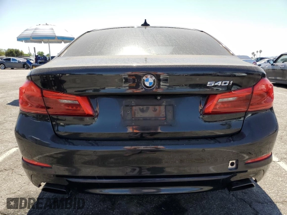 2019 BMW 5 Series 540i with VIN WBAJE5C54KWW12967, listed as a Copart auction lot 58490535 with 91,758 mi miles and Salvage title. Bid and sale history available at DreamBid. Image 6.
