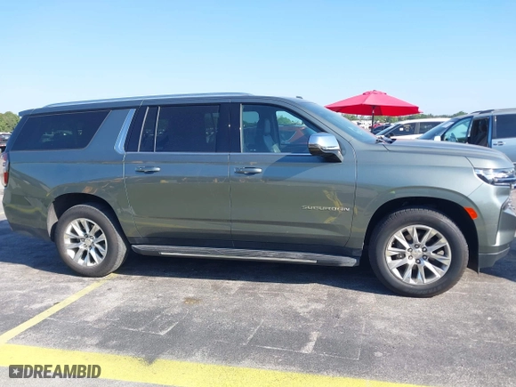 2023 Chevrolet Suburban Premier with VIN 1GNSCFKD4PR378869, listed as a IAAI auction lot 41802386 with 58,569 mi miles. Bid and sale history available at carsss.com. Image 13.
