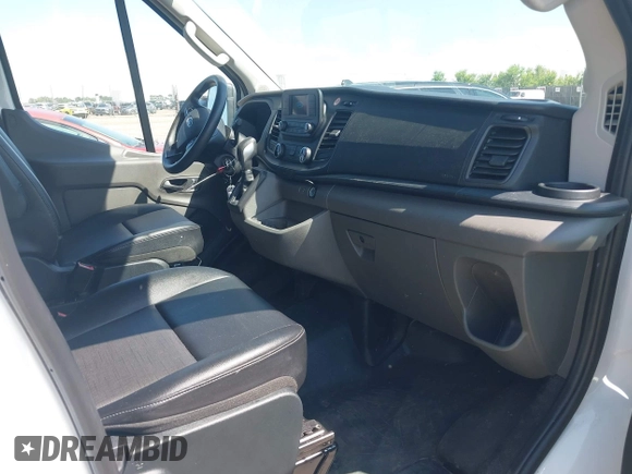2023 Ford Transit Cargo with VIN 1FTBR1X80PKB45974, listed as a IAAI auction lot 42609404 with 35,940 mi miles and . Bid and sale history available at DreamBid. Image 5.