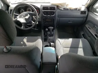 2004 Nissan Frontier SC z VIN 1N6MD29Y64C422771, wystawiony jako Copart lot #47132115 z przebiegiem 151 009 mil mil oraz Szkoda całkowita • Salvage title. Historia ofert i sprzedaży dostępna na DreamBid. Obrazek 8.