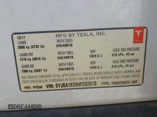 2017 Tesla Model S 100D with VIN 5YJSA1E20HF232570, listed as a IAAI auction lot 42037409 with 68,957 mi miles and . Bid and sale history available at DreamBid. Image 9.
