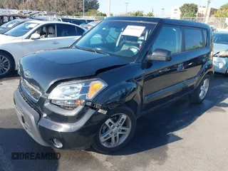 2010 Kia Soul + with VIN KNDJT2A26A7140621, listed as a IAAI auction lot 42001647 with 52,780 mi miles. Bid and sale history available at carsss.com. Image 2.