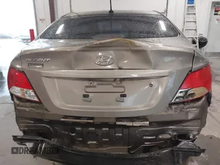 2013 Hyundai Accent GLS with VIN KMHCT4AE2DU486097, listed as a IAAI auction lot 41972806 with 295,949 mi miles. Bid and sale history available at carsss.com. Image 17.