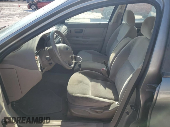 2003 Ford Taurus LX Standard with VIN 1FAFP52U13G243207, listed as a Copart auction lot 52763905 with 49,906 mi miles and Salvage title. Bid and sale history available at DreamBid. Image 7.