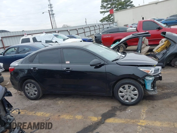 2023 Kia Rio S with VIN 3KPA24AD5PE560704, listed as a IAAI auction lot 41546929 with 51,114 mi miles. Bid and sale history available at carsss.com. Image 13.