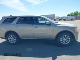 2014 Dodge Durango SXT with VIN 1C4RDJAG0EC455787, listed as a IAAI auction lot 42651627 with 103,218 mi miles and . Bid and sale history available at DreamBid. Image 13.